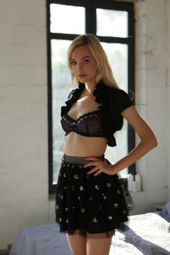 Svelte blond teen Kira W in lingerie bares big boobs and butt on nudesceleb.com