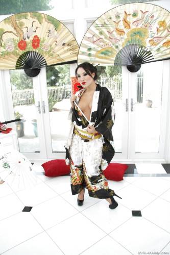 Very attractive japanese milf Asa Akira exhibiting big tits and spreading her legs - Japan on nudesceleb.com