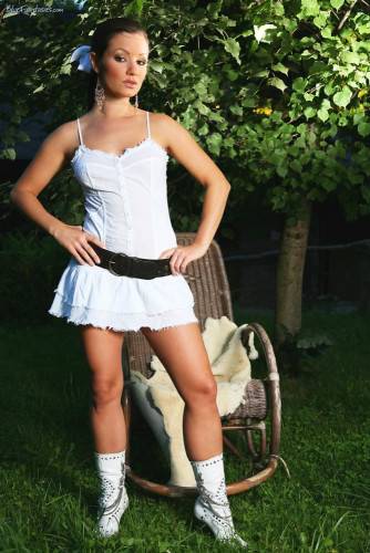 Brunette Jana Mrazkova Strips Her Garments In The Garden And Masturbates Wearing Only Leather Belt. on nudesceleb.com