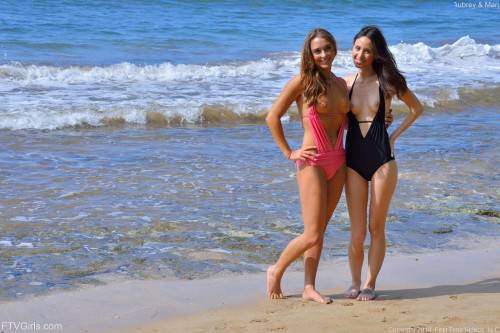 Seducing Lesbians Aubrey FTV And Mary Are Willing To Lose Off Their Bikinis At The Sea on nudesceleb.com