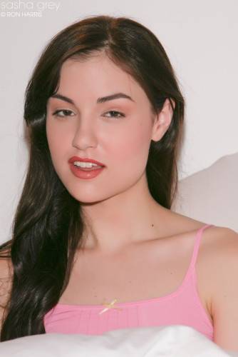 Lewd Brunette In Pink Lingerie Sasha Grey Naughtily Shows Tits And Flashes Pussy on nudesceleb.com