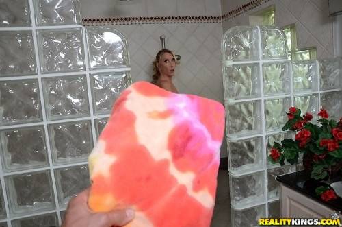Very attractive american blonde milf Brynn Hunter exhibiting big hooters and hot ass in shower - Usa on nudesceleb.com