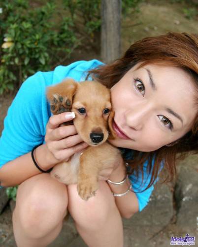 Posing With A Dog Is What One Of The Best Asian Babes Nao Idols Loves To Do. on nudesceleb.com