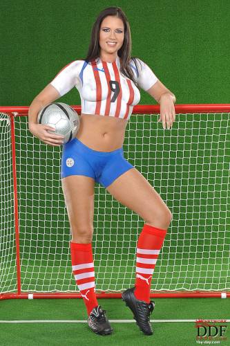 European Babe Veronica Da Souza In Painted Soccer Uniform Poses With A Ball on nudesceleb.com