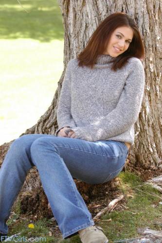 Attractive Brunette Faith Leon Pulls Down Her Jeans And Shows Her Juicy Snatch Near The Tree on nudesceleb.com