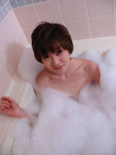 Short Haired Asian Honey Akina Hara Snacks On Her Boyfriend's Hairy Cock During A Bath. on nudesceleb.com