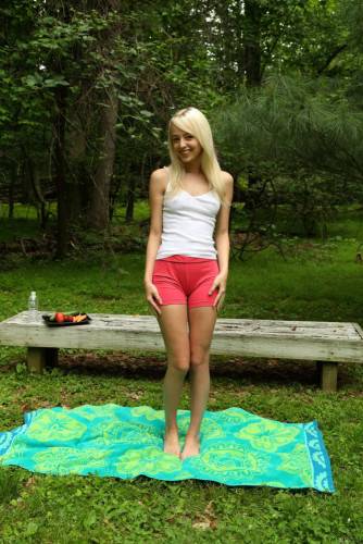 Blonde Teenager Sierra Nevadah Sets On The Green Lawn And Dildo Fucks The Beaver on nudesceleb.com