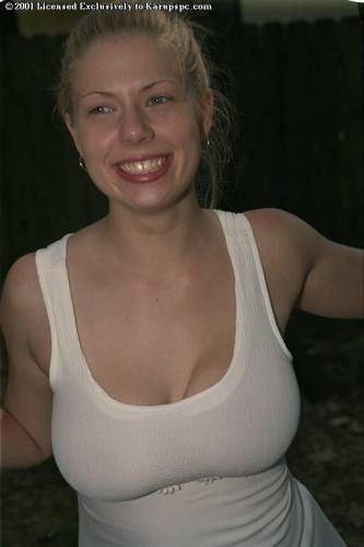 Slender youthful Christy in hot panties exposes big knockers and hot butt outdoor on nudesceleb.com