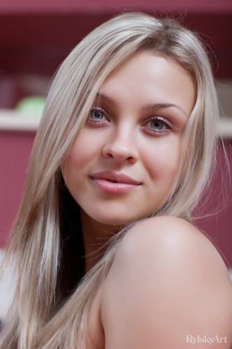 Excellent blond teen Luciana A in sexy stockings shows her butt and spreads her legs on nudesceleb.com