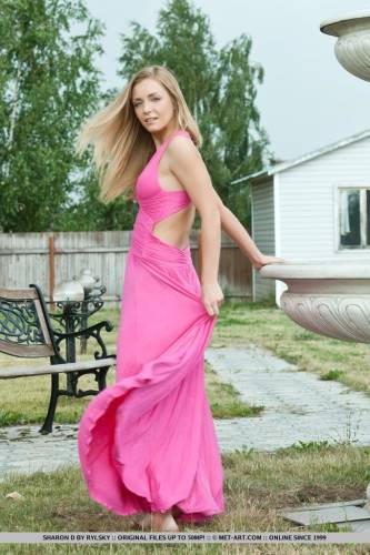 A Pink Dress Looks Great On Delicious Blonde Senta L As She Is Posing Outdoor. on nudesceleb.com
