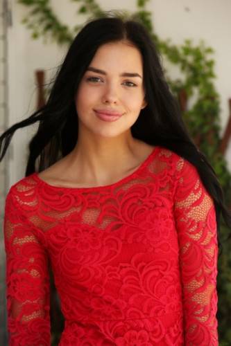 Raven-haired teen with hot lips Venice Lei strips her lace dress & poses naked on nudesceleb.com
