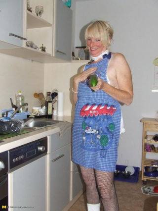 Naughty housewife gets frisky in the kitchen on nudesceleb.com