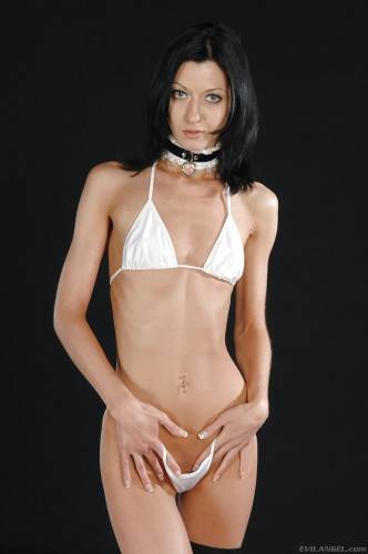 Stunning brunette hottie Izobella Clark in sexy bikini exposing her butt on nudesceleb.com