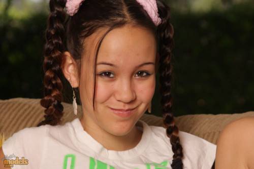 Skinny Oriental Teen Tiny Tabby In Braided Pigtails Shows Her A Size Tits And Spreads Her Tiny Twat on nudesceleb.com