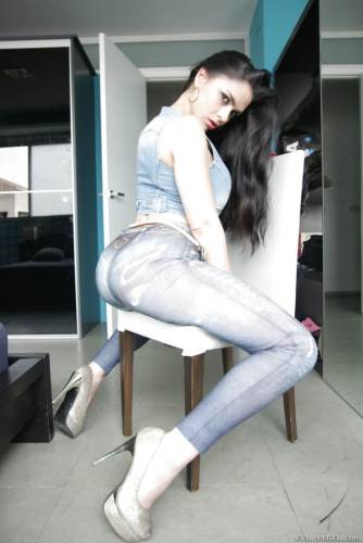 Charming latin brunette Marta La Croft in jeans revealing big tits and sexy ass on nudesceleb.com