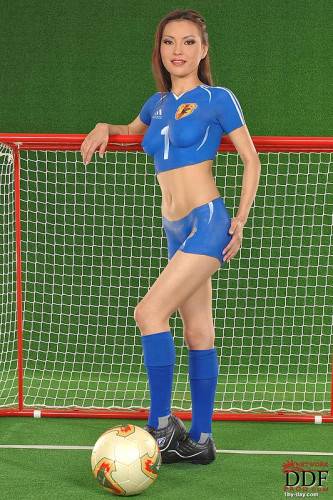 Oriental Body Art Model Annie Ling Pretends That She Wears Blue Skin Tight Soccer Uniform on nudesceleb.com