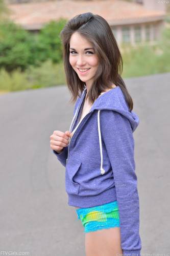 Smiling Brunette Teen Emily Grey Is In The Street Uncovering View On Hot Butt And Boobs on nudesceleb.com