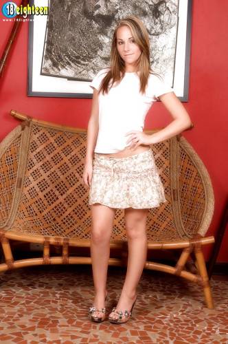 Stunning teen Fiona Rossi in sexy skirt unveiling tiny tits and spreading her legs on nudesceleb.com