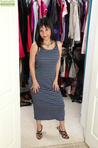Over Ripe MILF Marcy Darling Gets Kinky In The Closet By Stripping And Showing Her Busty Breasts. on nudesceleb.com