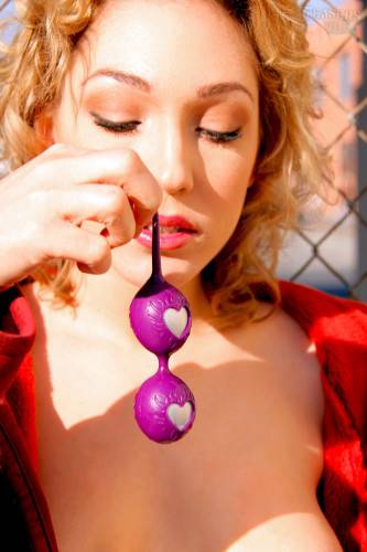 Lily Luvs In Long Red Coat Plays With Purple Vagina Balls In Public Place on nudesceleb.com