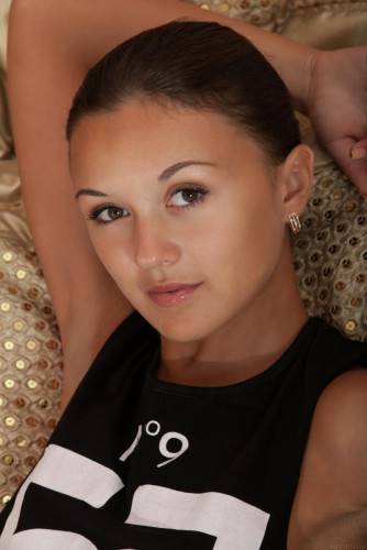 Tan Lines Teen Veselin Is Eager To Show Off Her Shaved Cooch And Slender Figure In Bed. on nudesceleb.com