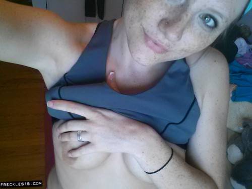 Sexy Brunette Freckles Takes Some Racy Pictures After A Workout Gets Her Soaked. on nudesceleb.com