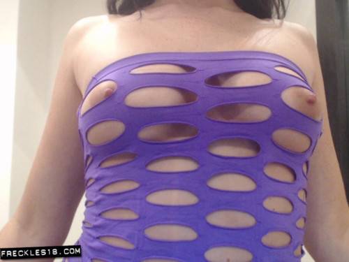 Brunette Freckles Puts On A Slutty, Purple Outfit And Teases In A Softcore Gallery. on nudesceleb.com