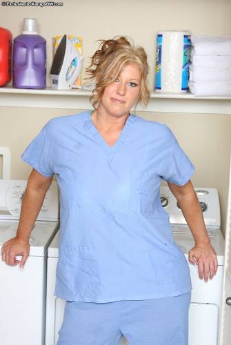Breasty Milf Nurse Zoey Andrews Removes Her Blue Uniform And White Underwear on nudesceleb.com
