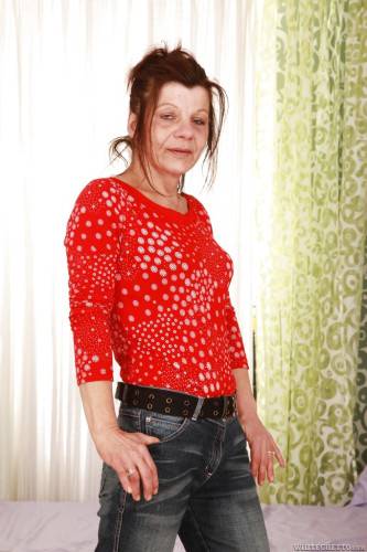 Superb grandma Ludmila in tight jeans spreads her legs on nudesceleb.com