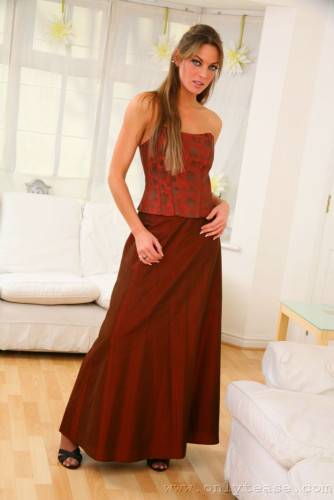 Fascinating Ali C Has Stockings And Garters Under Her Stylish Red Evening Gown on nudesceleb.com