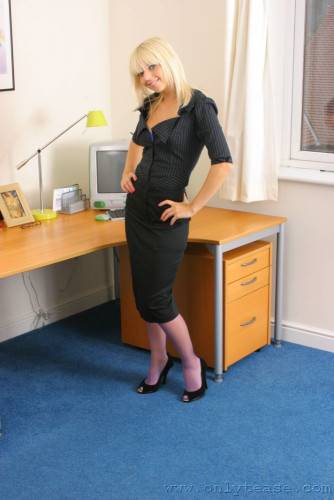 Sexy Blonde Secretary In Black Suit And Purple Nylons Gets Sexy In The Office on nudesceleb.com