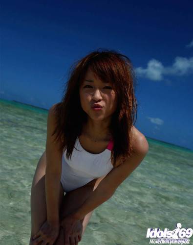 Slender japanese young Asuka Kyono in hot bikini shows small tits and hot ass at beach - Japan on nudesceleb.com
