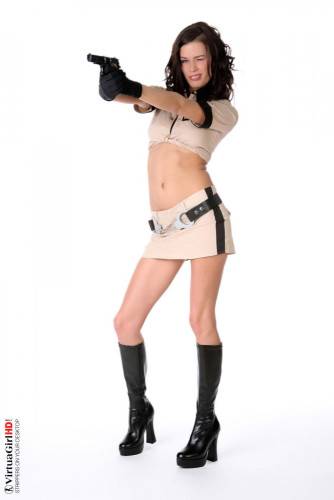 Mayline Nubiles Is Wearing A Uniform And Holding A Weapon. She Is Totally Dangerous. on nudesceleb.com