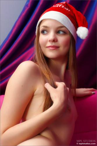Dirty Girl Amelie Femjoy Enjoys In Playing A Sexy Santa Girl On The Couch on nudesceleb.com