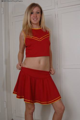 Blonde Allison Pierce In Red Cheerleader Uniform And White Panties Toys Her Pussy on nudesceleb.com