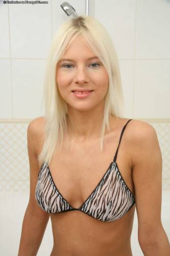 The Blonde Teen Barbie A Decided To Masturbate Shaved Nub In The Hot Bath on nudesceleb.com